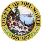 Seal of Del Norte County, Gold circle with text, Person leading a mule train, lighthouse in the ocean, redwood trees